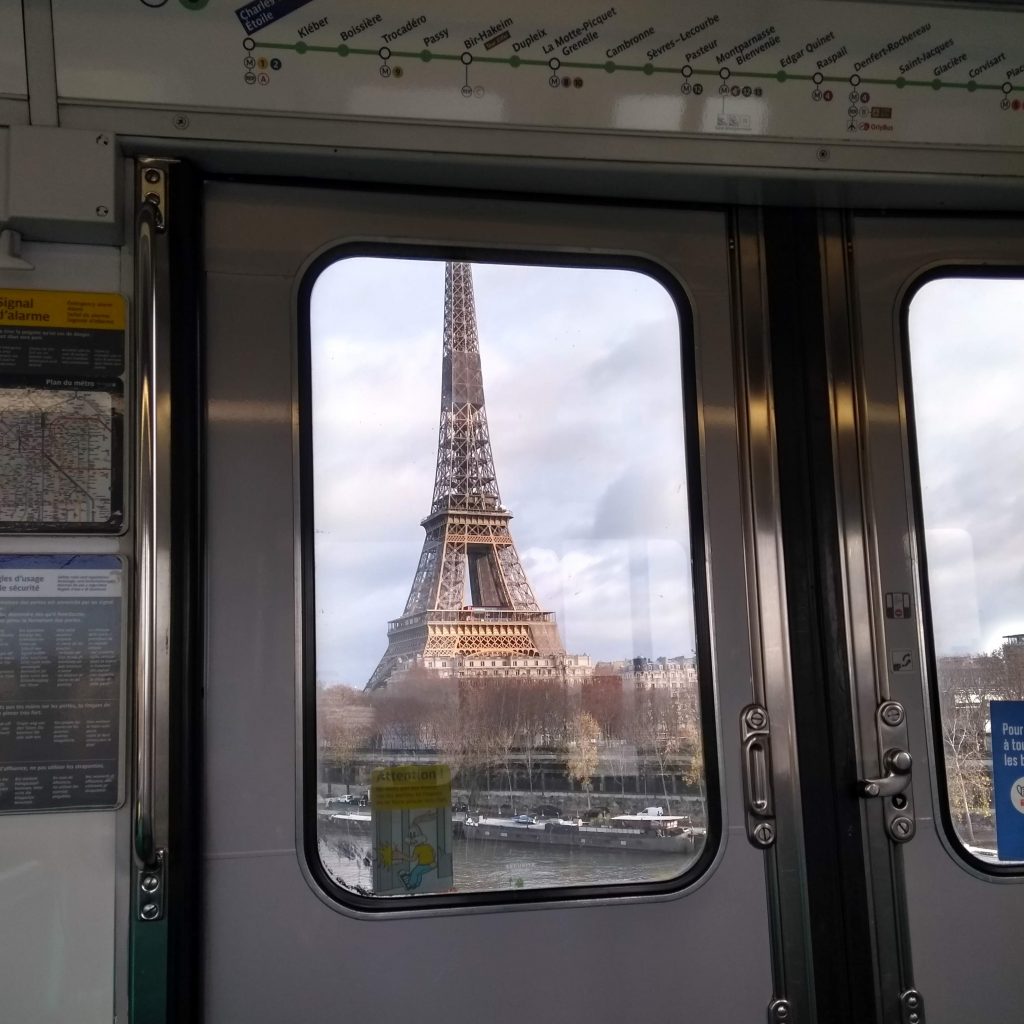 the eiffel tower in paris as seen from the metro