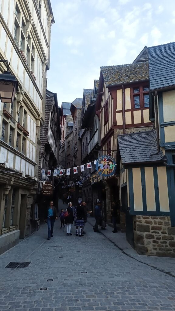 the grand rue inside the mont-saint-michel with its half-timber buildings