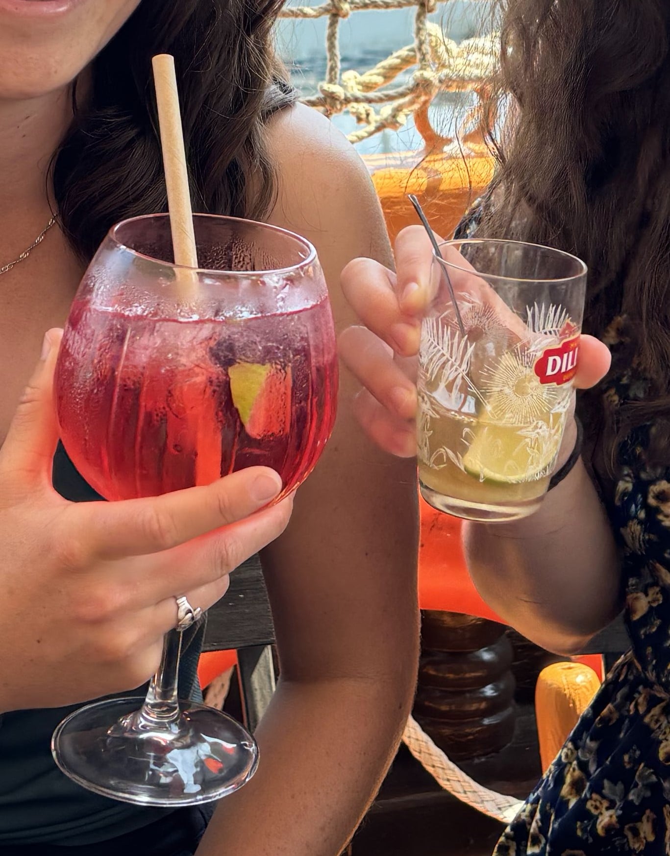 two people raising a glass in saint-malo